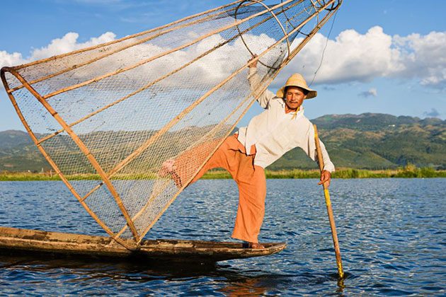 Leg-rowing fishermen on Inle Lake are a major tourist destination in Myanmar (Burma).